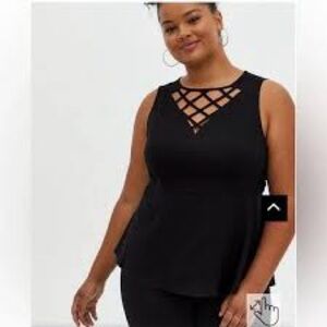 Torrid Womens Sleeveless Cage Front Peplum Black Blouse. Sz 2